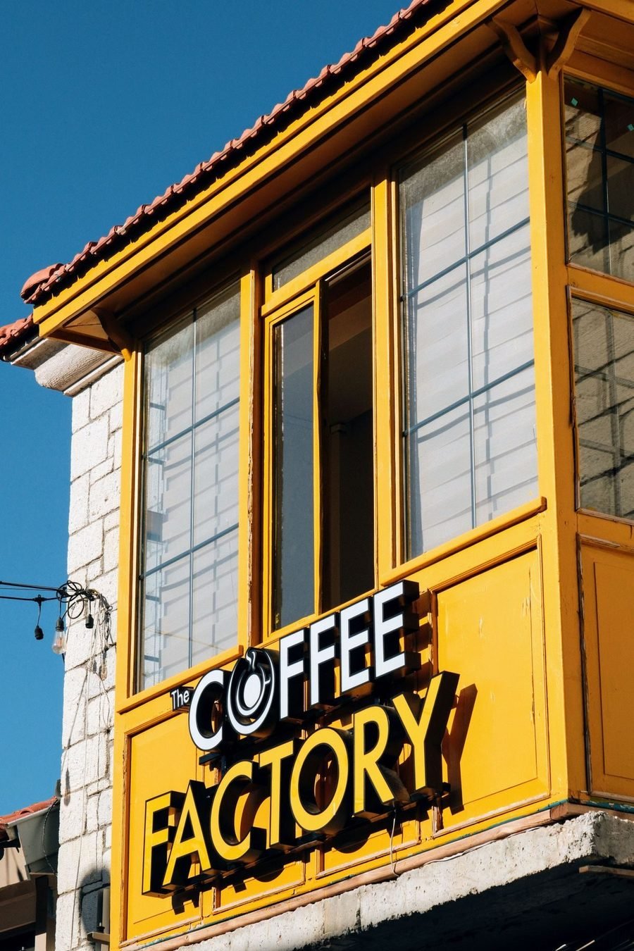 Colourful shopfront with bold outdoor signage